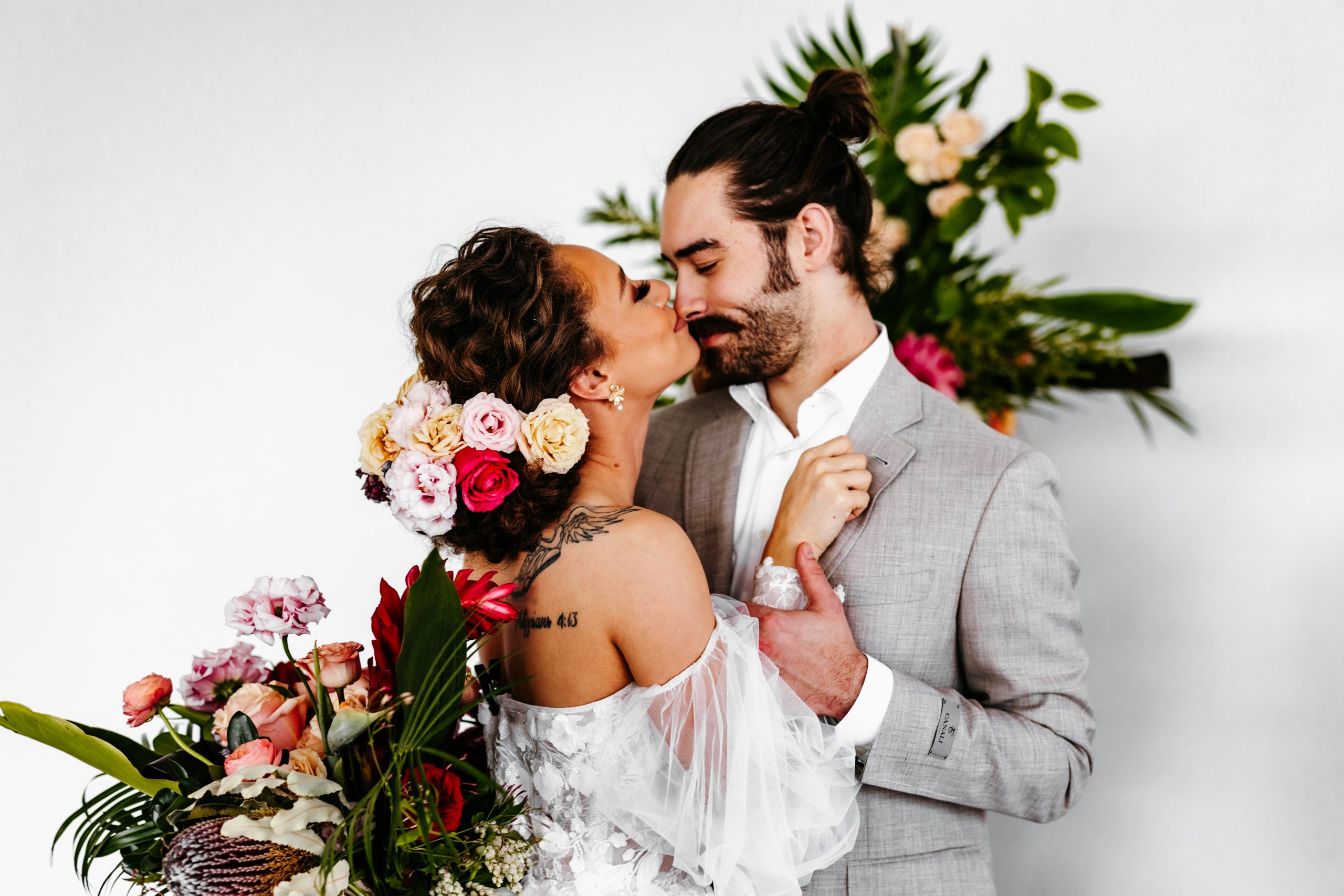 Bride kisses her husbands nose, captured by Minnesota Wedding photographer Images By Nic