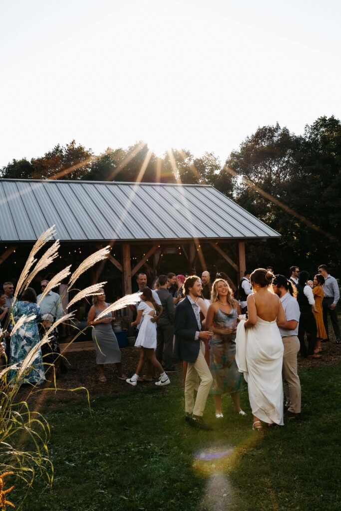 One of the  Minnesota wedding venues pavillions with guests at cocktail hour